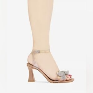 BCBGeneration Elegant Beige Heeled Sandals with Bow Accent